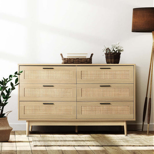 Rattan chest of drawers with lamp and baskets